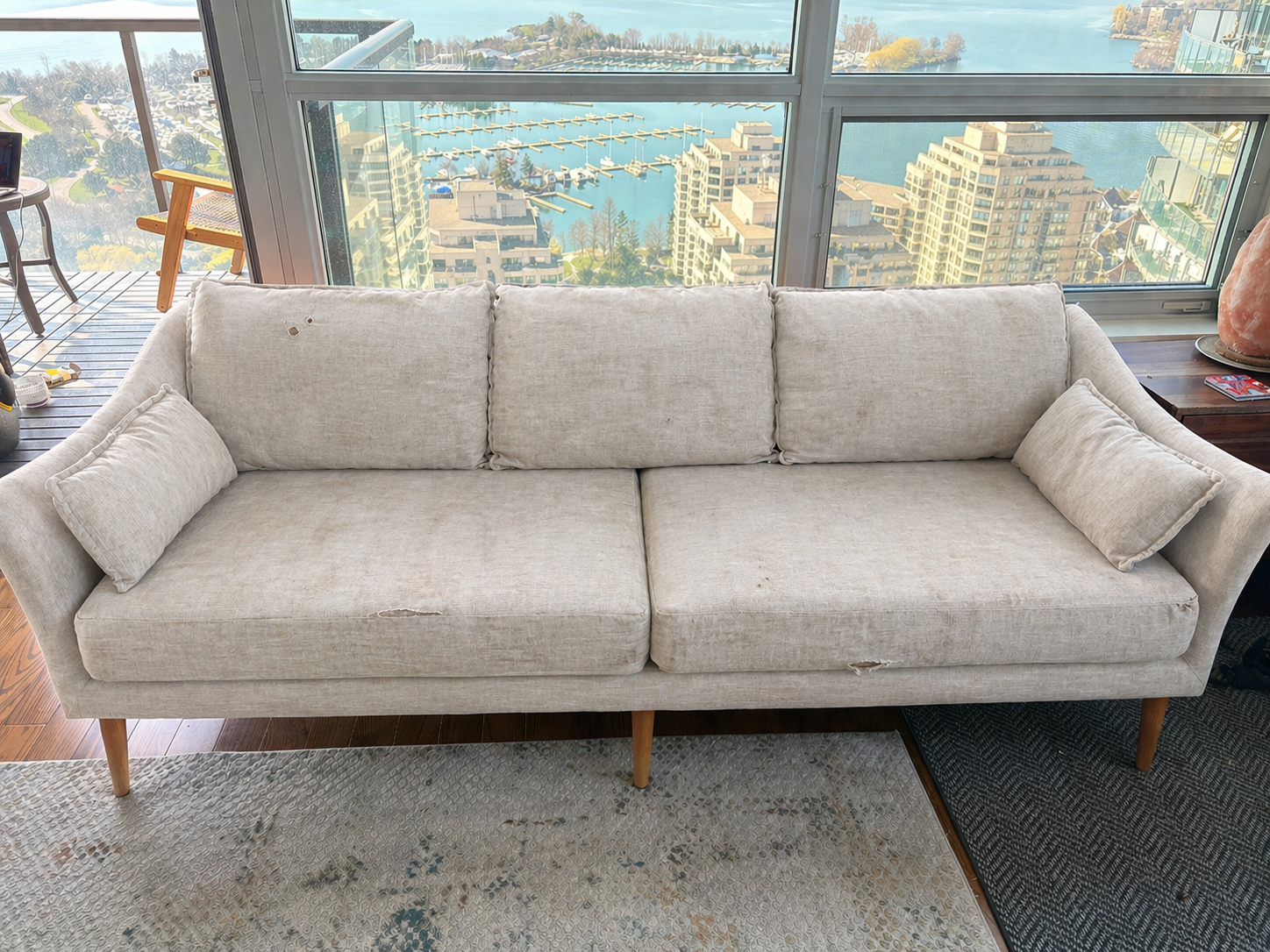 Before restoration example showing worn upholstery